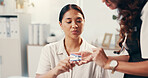 Doctor, woman and pulse oximeter at clinic for oxygen level reading, respiratory assessment and health checkup. Healthcare, patient and measure heart rate on finger for medical service and cardiology