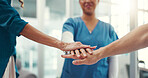 Hands, together and stack with medical team in hospital, support or mission for healthcare collaboration. People, group and doctor synergy in health, partnership and professional motivation in clinic