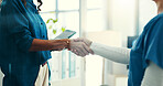 Handshake, onboarding and hospital management with nurse for new hire, partnership or welcome for healthcare. Introduction, thank you or medical recruitment with people shaking hands for doctor team