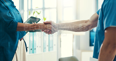 Buy stock photo Handshake, hiring and hospital management with nurse for new recruit, tablet or welcome for healthcare. Introduction, thank you or medical onboarding, people shaking hands for online doctor selection