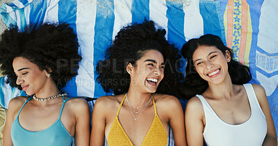 Buy stock photo Happy friends, girls and relax on blanket at beach for vacation, holiday and travel with top view. Women, smile and outdoor together at coast above for funny conversation, laugh or bonding in summer