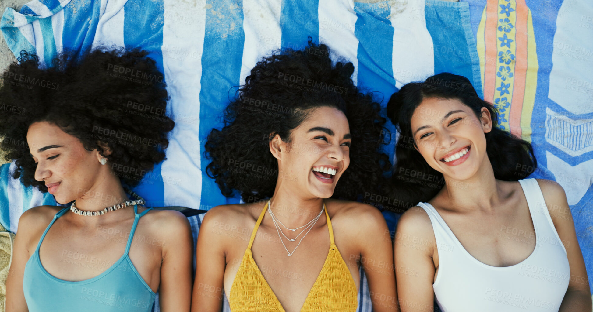 Buy stock photo Happy friends, girls and relax on blanket at beach for vacation, holiday and travel with top view. Women, smile and outdoor together at coast above for funny conversation, laugh or bonding in summer