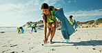 Woman, volunteer and cleaning beach with bag for recycling, eco friendly environment or earth day. Female person, activist or community service with pollution or dirt for charity or climate change