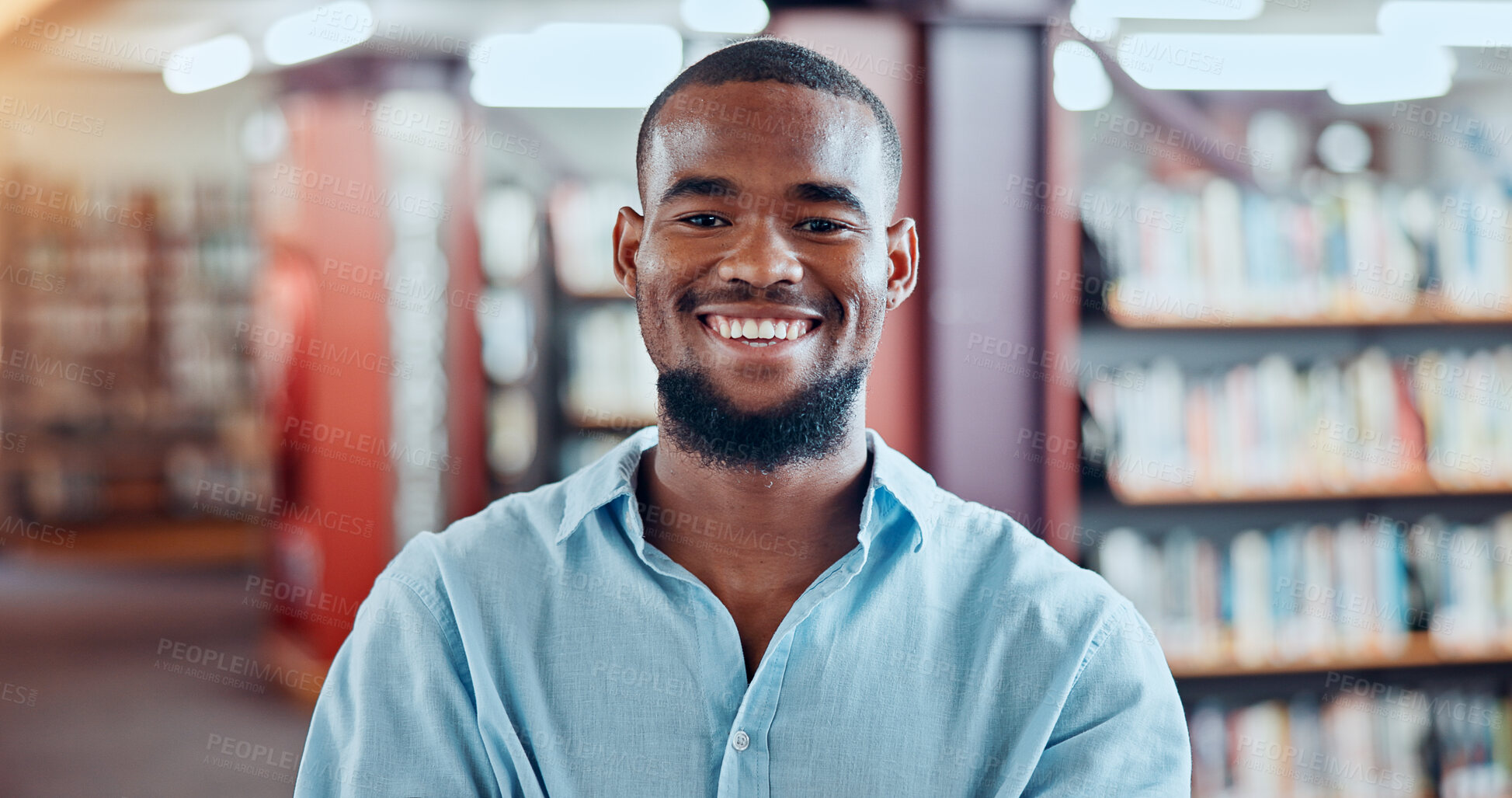 Buy stock photo Portrait, teacher and happy black man in library for knowledge, education and learning in college. Smile, bookstore and educator in university for academic career, development and confidence in Kenya
