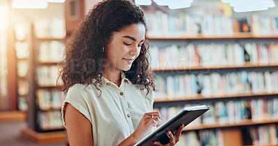 Buy stock photo Education, college and woman with tablet in library for knowledge, reading and studying. Technology, bookstore and happy student research in university with pen for assignment or learning online
