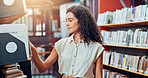 Woman, student and search for book at library, reading and check for title with studying for scholarship. Person, education and bookshelf for literature, research or project for learning at college