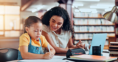 Buy stock photo Mom, girl and education with writing at library with smile, notes and support for assessment, development or reading. Family, mother and daughter with pc, book or guide with learning for scholarship