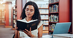 Woman, bible and reading at library, learning or theology student with ethics at university. Girl, person and research for religion, history or book for project, scholarship or education at college