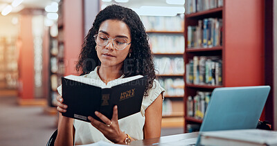 Buy stock photo Woman, bible and reading at library, learning or theology student with ethics at university. Girl, person and research for religion, history or book for project, scholarship or education at college