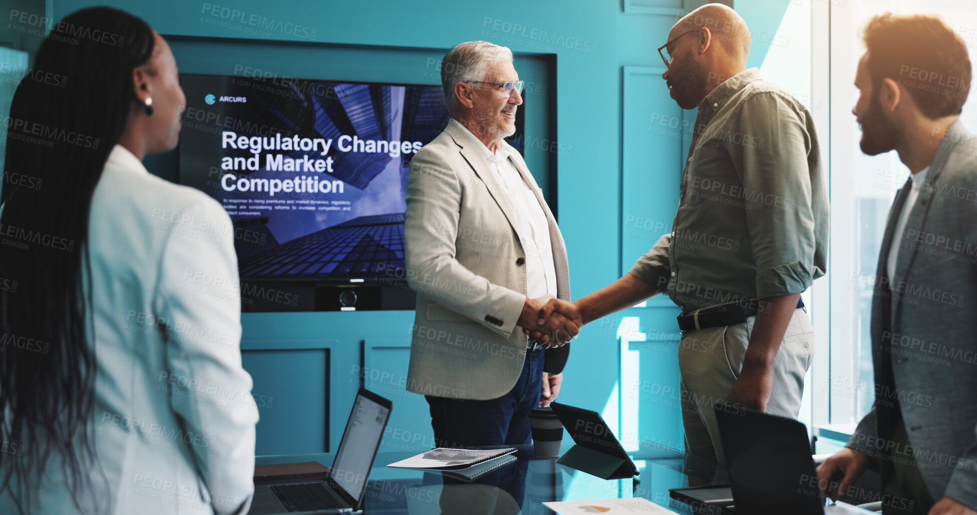 Buy stock photo Investor, handshake and people in presentation for business, discussion and market competition. Screen, happy colleagues and shaking hands for regulatory changes, partnership and gesture for success
