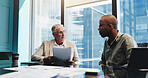 Meeting, colleagues and men with documents, talking and discussion for stats, teamwork and company. Boardroom, corporate and analysis of updates in business, employee and collaboration with boss