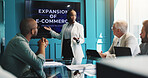 Woman, presentation and meeting with screen for expansion, ecommerce or online marketing at conference. Female person, employee or speaker with team for discussion or scalability on growing platform