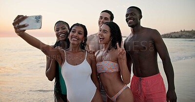 Buy stock photo Sunset, happy and friends at beach for selfie, travel and tropical vacation in Bahamas with smile. Social media, reunion and group of people by ocean for photograph, adventure and holiday picture