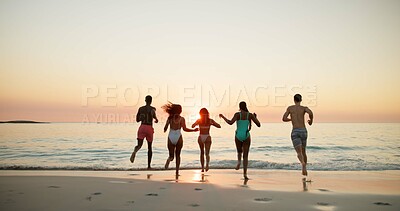 Buy stock photo Back, people and run for fun on beach for summer vacation, tropical journey and travel weekend. Friends, playful and energy with ocean sunset, social gathering and holiday adventure for getaway trip