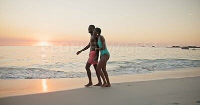 Buy stock photo Smile, black couple and laugh for walk on beach of summer vacation, tropical journey and romantic date. Happy, people and holding hands for ocean travel, commitment and funny joke for getaway holiday