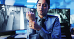 Wrist pain, security guard and woman with strain, frustrated or cctv screen in night shift for safety. Arthritis, carpal tunnel or person with video surveillance in control room for protection agency