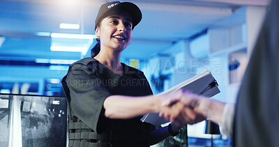 Buy stock photo Security, woman and handshake in office for greeting, welcome or surveillance contract. People, smile and shaking hands with guard for safety agreement, cctv deal and paper for partnership at night