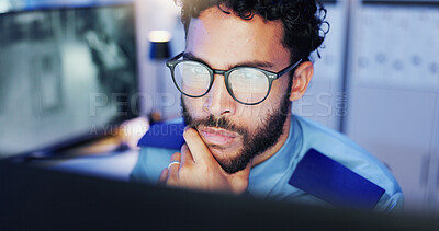 Buy stock photo Night, footage and security guard with computer, man and monitoring of danger with tech and safety. Watching, video and person with glasses in control room, protection and serious for observation