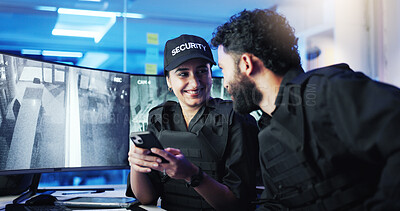 Buy stock photo Happy people, security guard and night with phone for surveillance or supervision at protection agency. Man, woman or officers working late with smile on mobile smartphone for safety in control room