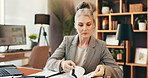 Accounting, paperwork and mature business woman with budget, bookkeeping and reading finance report. Auditor, check document and serious manager in office for revenue, income or payroll information