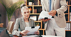 Woman, lawyer and meeting with paperwork in office for legal consulting, review contact and company case. Mature client, attorney and documents for settlement, information and procedure of management