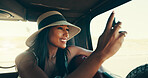 Road trip, photography and woman with smartphone, car and sightseeing of desert, travel and summer holiday. Commuting, influencer and person with mobile for social media post, picture and tourism