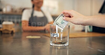 Buy stock photo Person, hands and bills for tips at cafe for service excellence, gratitude or kind gesture on countertop. Closeup, shopper or customer with dollar, money or cash in glass for payment or contribution