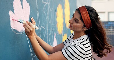 Buy stock photo Painting, mural and woman with flowers on wall for art design, creative project and community service. Artist, volunteer and person with paintbrush outdoor for decor, inspiration or DIY hobby in city