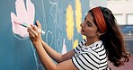 Painting, mural and woman with flowers on wall for art design, creative project and community service. Artist, volunteer and person with paintbrush outdoor for decor, inspiration or DIY hobby in city