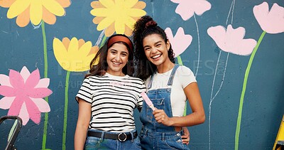 Buy stock photo Mural, artist and women with paintbrush, outdoor and proud of decoration for wall and creative. Confident, painter and people with design in neighbourhood, portrait and community project in Canada