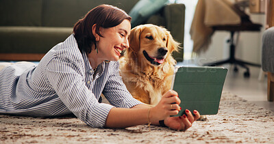 Buy stock photo Home, tablet and woman with dog on floor for relaxing, online video and playing together. Best friend, pet animal and happy owner with Golden Retriever on digital tech for selfie, bonding and fun