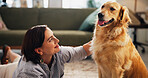 Love, petting and dog with woman on floor of living room for relax, bonding and loyalty. Trust, animal adoption and care with person and golden retriever at home for support, domestic and happiness