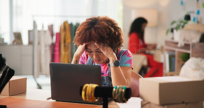 Buy stock photo Woman, fashion designer and laptop with stress at workshop for order, frustrated or 404 glitch. Person, computer and headache with fatigue for fabric shipping, supplier or pain with clothes at studio
