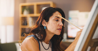 Buy stock photo Artist, woman and painting in home for inspiration, art or design process for project in lounge. Brush, canvas and painter drawing with tools for hobby, color or creative sketch with talent for craft