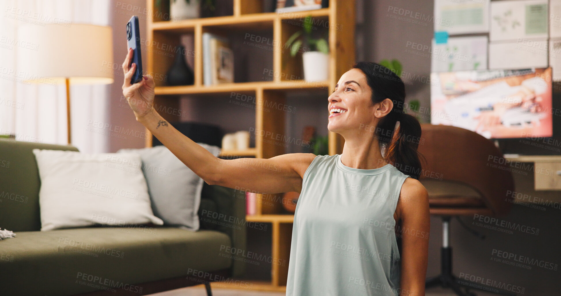 Buy stock photo Selfie, woman and home with fitness break for social media post, photography or memory in lounge. Health blog, exercise influencer and person in  house for content creation with smile for picture