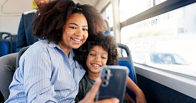 Buy stock photo Happy, child and mother with phone on bus for morning commute or social media post. Online message, passenger or kid in city with mom, parent or smile in public transport for funny meme in New York 