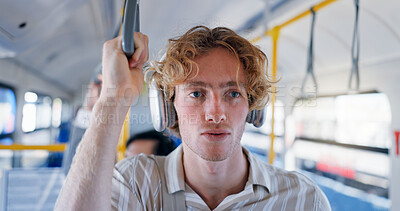 Buy stock photo Music, travel and man in bus with headphones for streaming podcast, song and playlist on morning commute. Public transport, passenger and listening to audio, sound and student thinking on journey