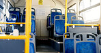Public, empty bus and transportation for travel, urban trip and ergonomic seats. Coach cabin, transit service and interior of metro for tourism, commute and journey in vehicle with glass window