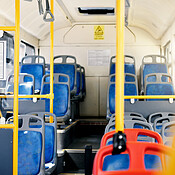 Travel, empty bus and public transportation with seats for commute ...