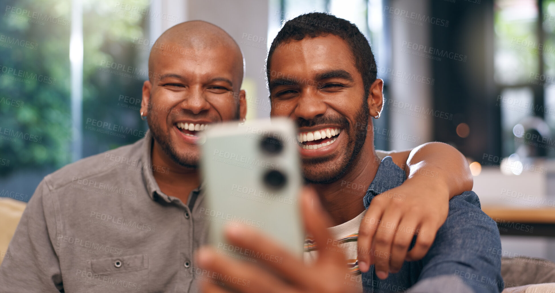 Buy stock photo Gay, laughing or happy couple on video call in home together for bonding, relationship or love. Virtual chat, lgbtq or queer men with smile or funny joke on mobile app for social media, hug or selfie