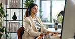 Consultant, woman and customer service in office with computer, communication and online consulting. Typing, advice or call center for CRM contact support, discussion or sales agent with business
