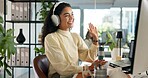 Video call, wave and business woman on computer for conversation, online chat or virtual meeting. Company consultant, greeting and person with headphones for discussion, talking and webinar in office