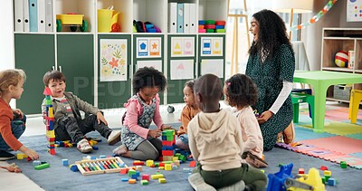 Buy stock photo Building blocks, learning and teacher with children in classroom for education, playful or creative games. Growth, kindergarten or academy with woman and kids at school for toys and child development