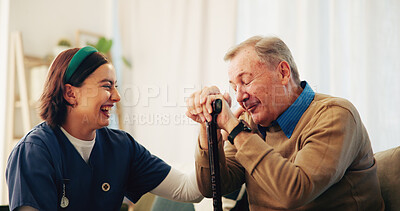Buy stock photo Home, funny and nurse with senior man, smile and laughing with happiness, bonding together and joke. Pensioner, old person and caregiver with comedy, cheerful and support with humor, relax and trust