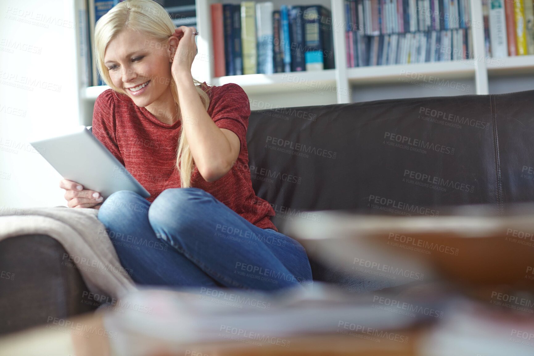 Buy stock photo Woman, home and tablet on sofa with video call or online shopping with a smile. Living room, happy and internet sale with digital, tech and website in a lounge with social media and download