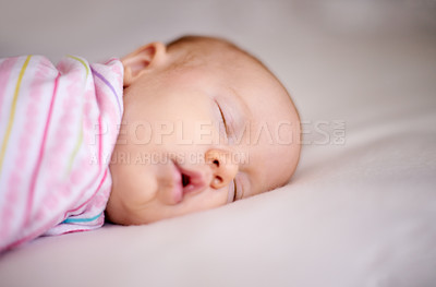 Buy stock photo Tired, baby and blanket with sleeping on bed for comfortable, development and resting at home. Cute, sweet and infant with nap on linen in nursery for peaceful dreaming, childhood and healthy growth