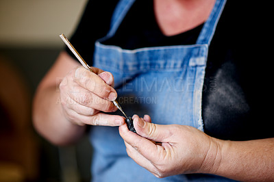Buy stock photo Pottery, art and hands of person with tools in workshop for design, handicraft and clay object. Carving, creative and artist with equipment for ceramic sculpture for hobby, learning and pattern