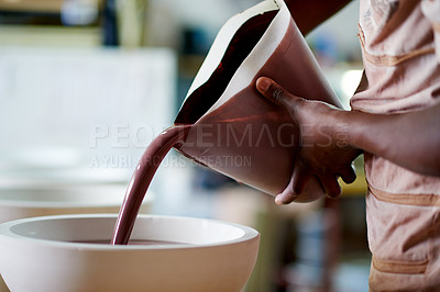Buy stock photo Person, hands and pour with paint in bowl for color mixture, DIY or arts and crafts at workshop. Closeup, potter or artisan or creative with liquid for pottery design, creativity or crockery decor