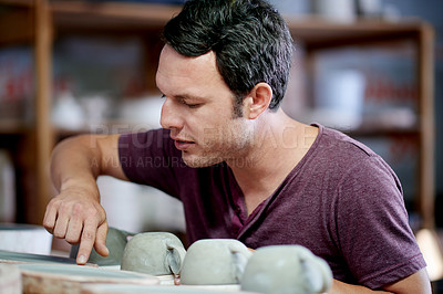 Buy stock photo Man, clay and pottery with inspection at workshop for ceramic manufacturing, craft and process for sculpture. Person, art and business owner with check, patterns and results with creativity at studio
