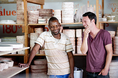 Buy stock photo Pottery, small business and men in workshop talking for planning, creative hobby and startup. Team, art studio and happy people in discussion for clay object, ceramic craft and design on shelf